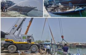 نجات لنج تجاری غرق‌شده در اسکله دیر